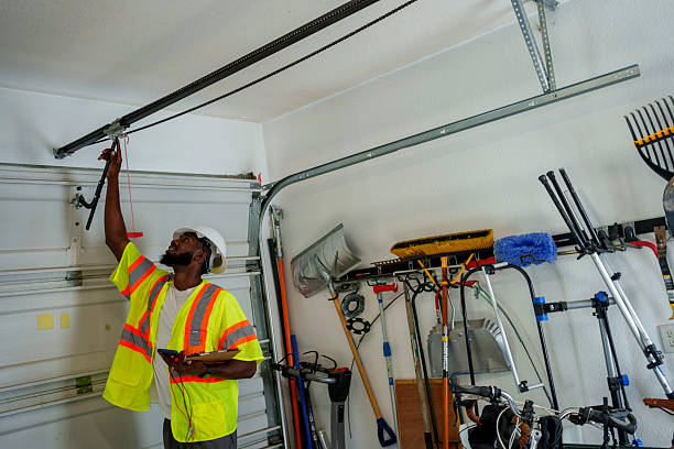 Professional Garage Door Spring Repair technician working in Worthington, IN